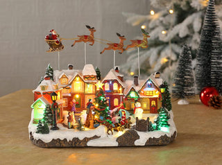 Villa navideña con luz y música 35x22x28,5cm DF67026